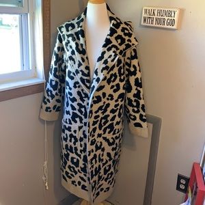 Wrap this Sweater around you for those Cold Winter Days.